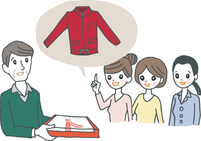 真っ赤なジャケットをプレゼントされている還暦の男性